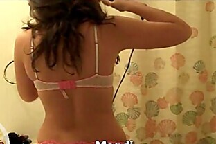 Sexy Cam Girl Doing Hair in a Bra
