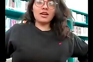 Beautiful College girl with nerd glasses flashing the most perfect tits in her library