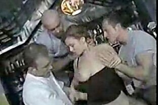Brunette Gangbanged in Bar
