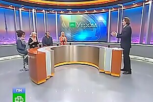 Bimbo blonde on panel of Russian TV show - upskirt porn at