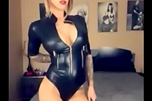 The Perfect Dominatrix Models Her Catsuit