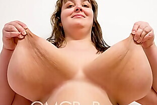 Saggy beautiful MILF oils tits at home
