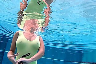 My transparent when wet one piece swimwear in public pool
