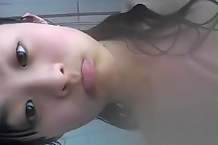 A schoolgirl who takes a bath 