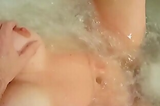 Wife orgasms from jacuzzi jet and nipple play