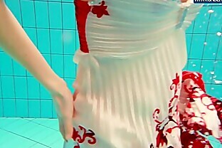 Hot Polish redhead swimming in the pool