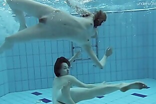 Short hair Gymnast with Condom at underwater