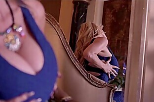 Sexy MILF Kelly Madison Shakes Her Huge Boobs In A Blue Dress