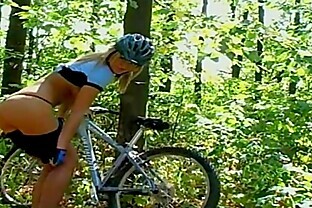 Super hot sporty girl plays with herself in the forest